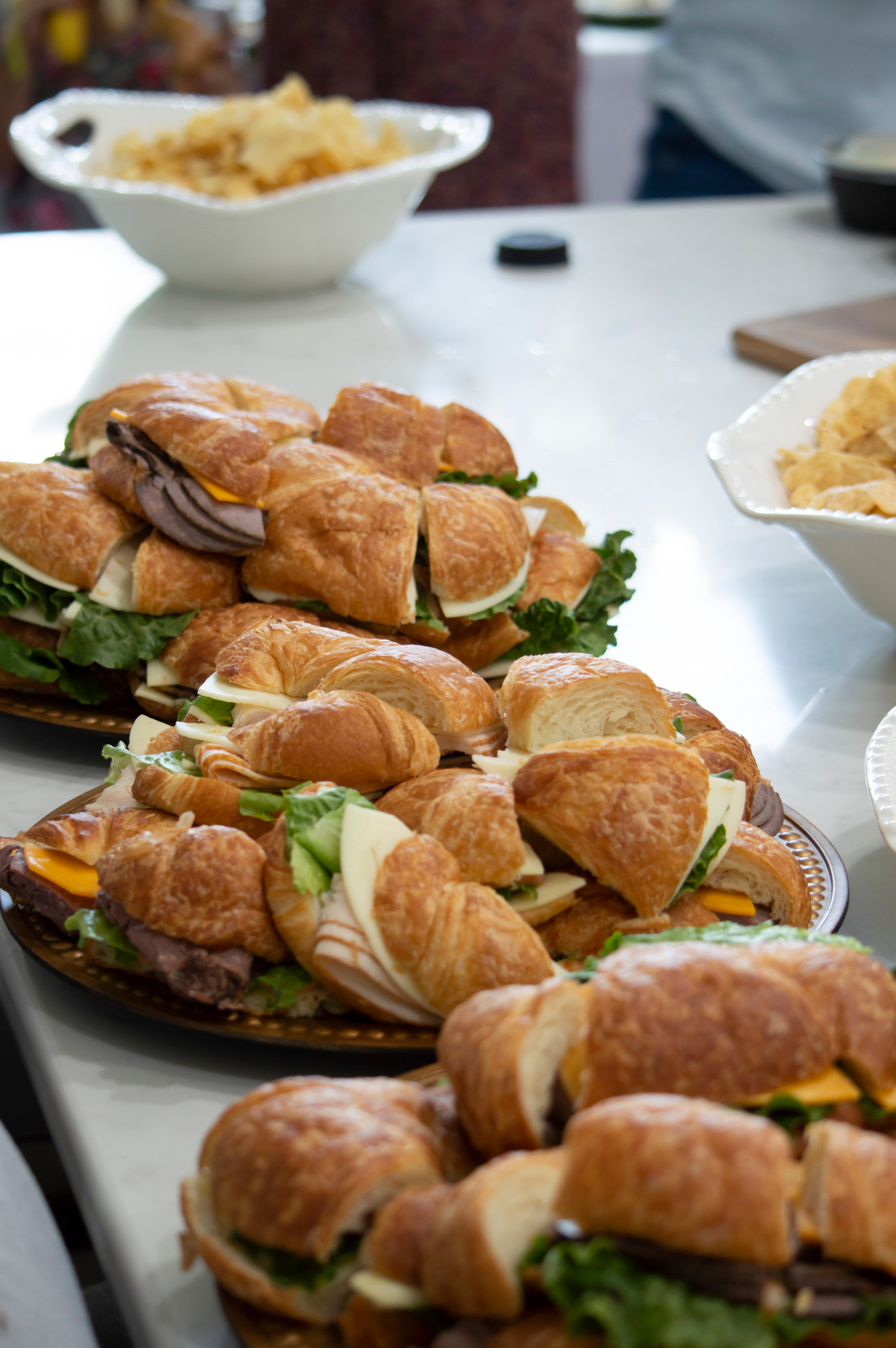 A platter of assorted sandwiches